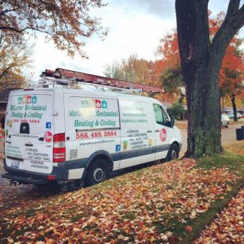 McCarver Mechanical Heating & Cooling truck in autumn in front of a home that requested Farmington furnace maintenance